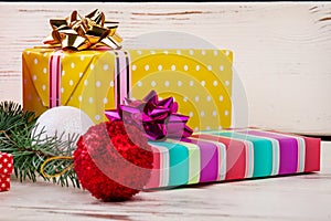 Beautiful colorful Christmas gifts with balls.