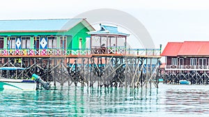 Beautiful and colorful cottages at Derawan Island Resort,