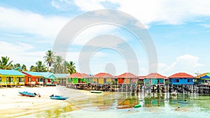 Beautiful and colorful cottages at Derawan Island Resort,