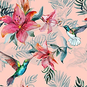 Beautiful colorful flying hummingbirds and red flowers on pink background. Exotic tropical seamless pattern. Watecolor painting.