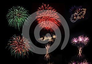 Beautiful colorful holiday fireworks on the black sky background