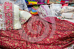 Beautiful colorful Indian sarees , displayed for sale at market place, Jaisalmer, India