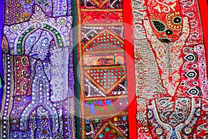 Beautiful colorful Indian sarees, displayed for sale at market place, Jaisalmer, India