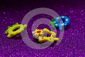 Beautiful and colorful kids hair clips on a purple background