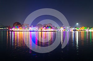 Beautiful and colorful lights reflected in the water of kankaria lake ahmedabad, gujarat