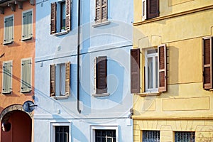Beautiful colorful mediterranean house facades in Desenzano del Garda town