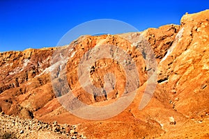 Mineral streaks and sediments in a old abandoned quarry photo