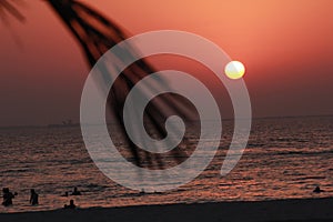 Beautiful colorful sea beach sunrise sunset colorful sky view people walking