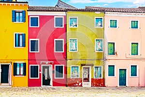 Beautiful colorful small houses at Burano island near Venice, Italy. Famous tourism attraction