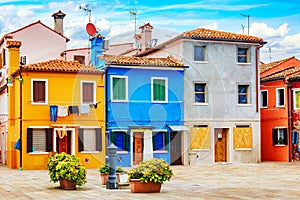 Beautiful colorful small houses at Burano island near Venice, Italy. Famous tourism attraction