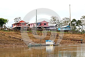 Colorful stilt houses on rio negro - Manaus, Brazil photo
