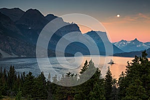 Beautiful colorful sunrise over St. Mary Lake and wild goose island in Glacier national park