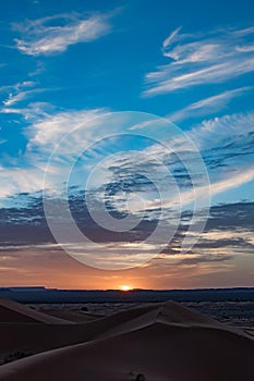 Beautiful colorful sunset in Erg Chebbi Dunes, Sahara Desert, Merzouga, Morocco