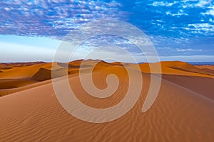 Beautiful colorful sunset in Erg Chebbi Dunes, Sahara Desert, Merzouga, Morocco