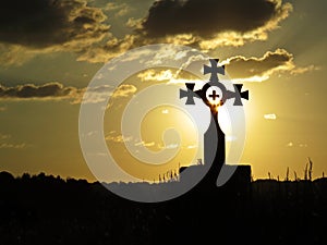 Beautiful Colorful Sunset Over Special Cross with Crosses Inside