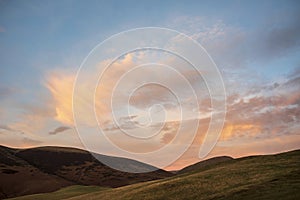 Beautiful colorful Winter sunset landscape over Latrigg Fell in Lake District