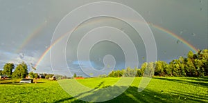 beautiful complete rainbow in sweden land