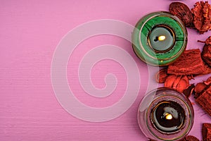 Beautiful composition with burning candles on wooden background