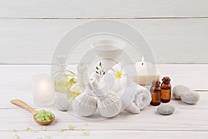 Beautiful composition of spa treatment on wooden background.