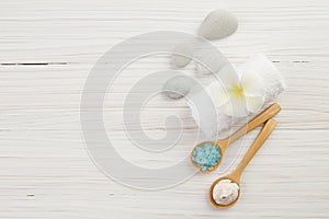 Beautiful composition of spa treatment on wooden background.