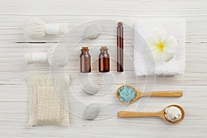 Beautiful composition of spa treatment on wooden background top