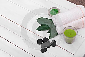 Beautiful composition of spa treatment on wooden table