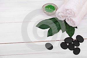 Beautiful composition of spa treatment on wooden table