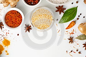 Beautiful composition with various spices on white background