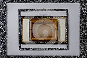 Composition with frames of various sizes and materials