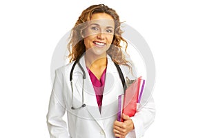 Beautiful confident female doctor holding clipboard smiling