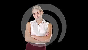 Beautiful confident young businesswoman standing with hands folded, Alpha Channel