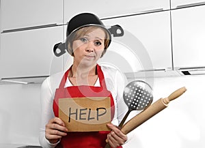 Beautiful cook woman confused and frustrated face expression wearing red apron asking for help holding rolling pin