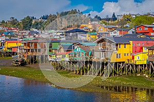 Beautiful coorful houses on stilts palafitos in Castro, Chiloe Island