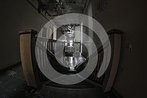 Beautiful corridor and staircase in an old abandoned manor house