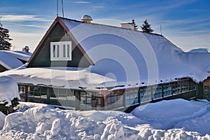 Beautiful cottageduring winter in Donovaly with snow