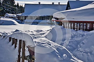 Beautiful cottages during winter in Donovaly with snow