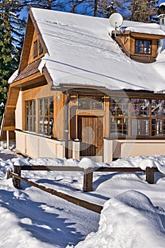 Beautiful cottage during winter in Donovaly with snow