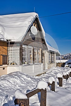 Beautiful cottage during winter in Donovaly with snow