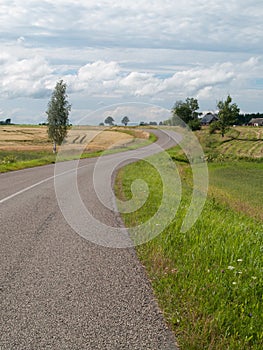 Beautiful Countryside asphalth  Road and cloudy sky .