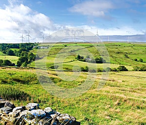 Beautiful countryside with windfarm in view.