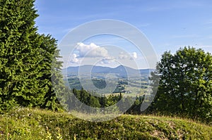 Beautiful countryside with ïreen meadows and valleys between the hills. Carpathians Ukraine