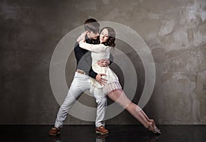 Beautiful couple in the active ballroom dance