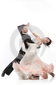 Beautiful couple in the active ballroom dance photo