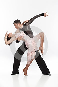 Beautiful couple in the active ballroom dance photo