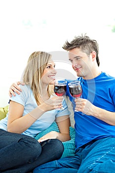 Beautiful couple drinking wine together