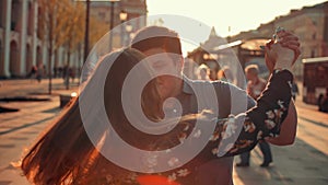 A beautiful couple, guy and girl, dancing