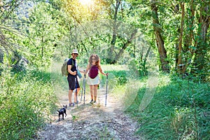 Beautiful couple of hiker wearing backpack smiling happy