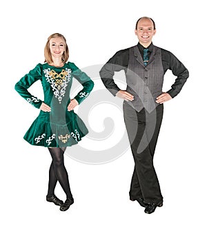 Beautiful couple in Irish dance green dress isolated