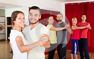 Beautiful couple learning to dance