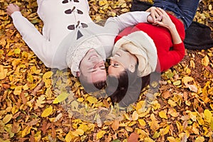 Beautiful couple lying on the ground